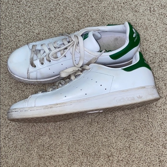 white adidas shoes with green back